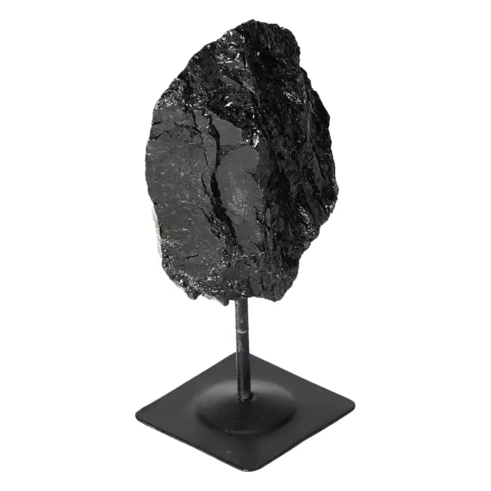 Rough Black Tourmaline Crystal on Metal Stand for Energy Cleansing and Grounding by Sylvia Crystals.