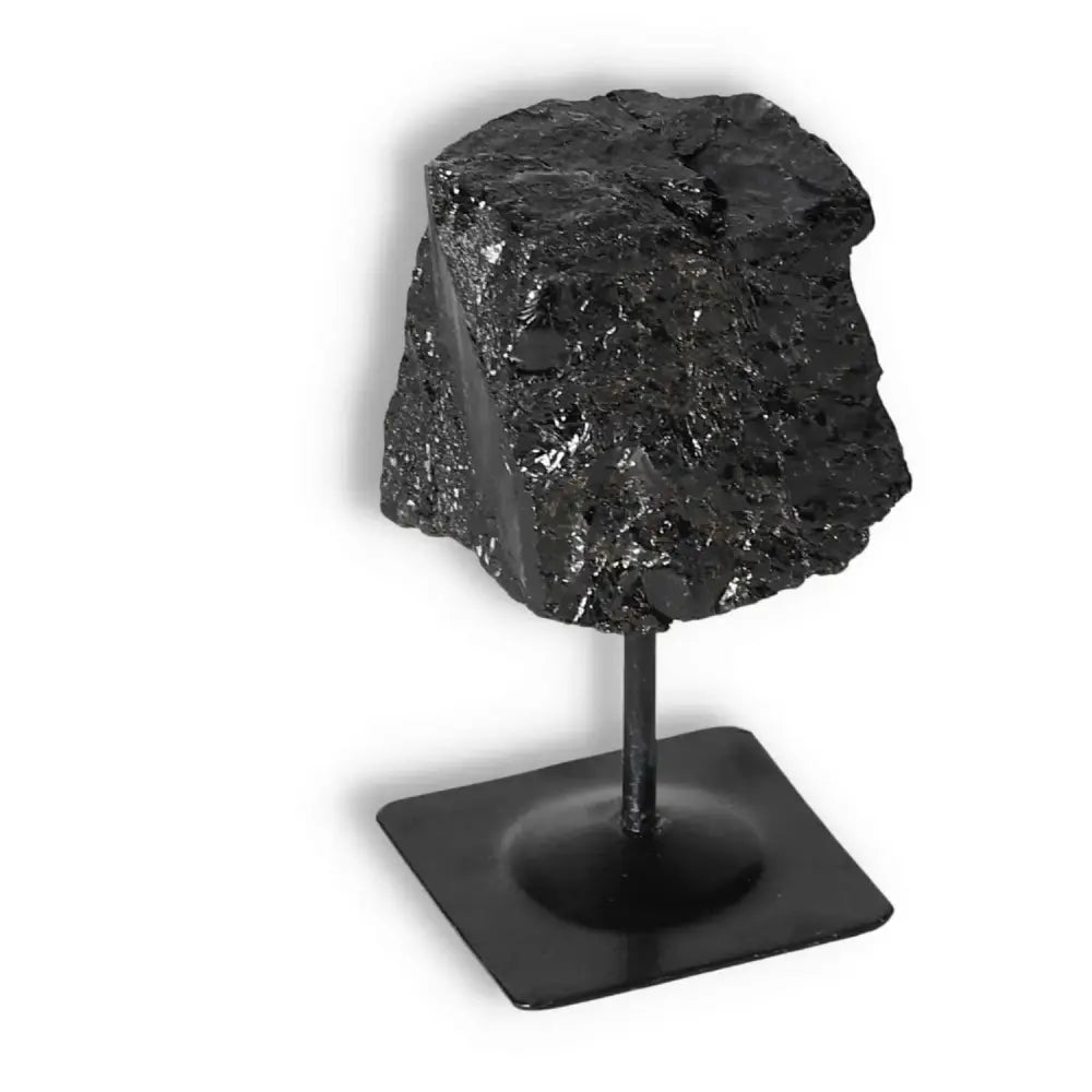 Rough Black Tourmaline with Metal Stand S, premium crystal from Sylvia Crystals, known for cleansing and healing properties.