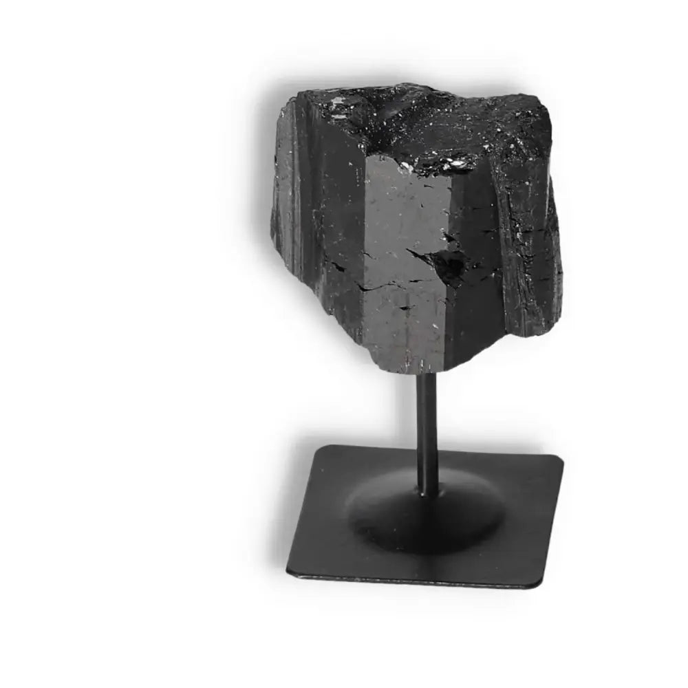 Rough Black Tourmaline with Metal Stand S by Sylvia Crystals, known for cleansing and mental balance.