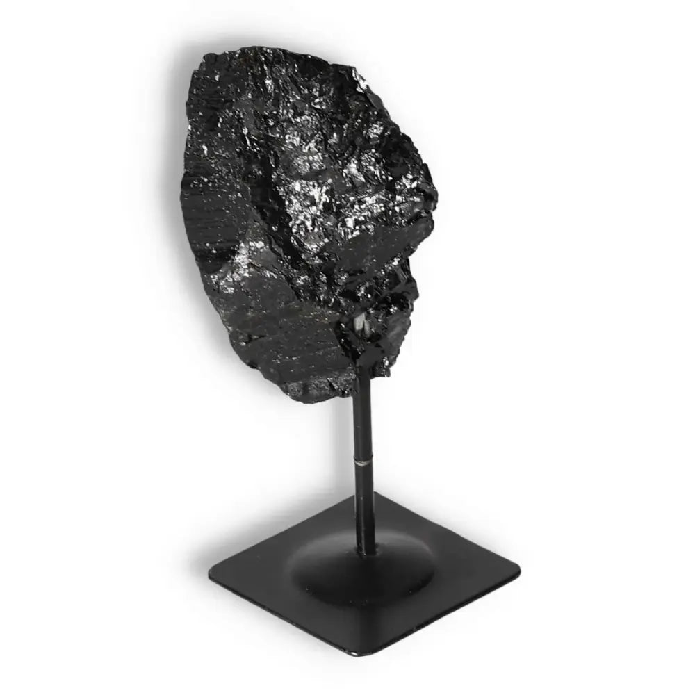Rough Black Tourmaline on Metal Stand S; a powerful crystal decor piece for dispelling negative energies, ideal for spiritual healing.