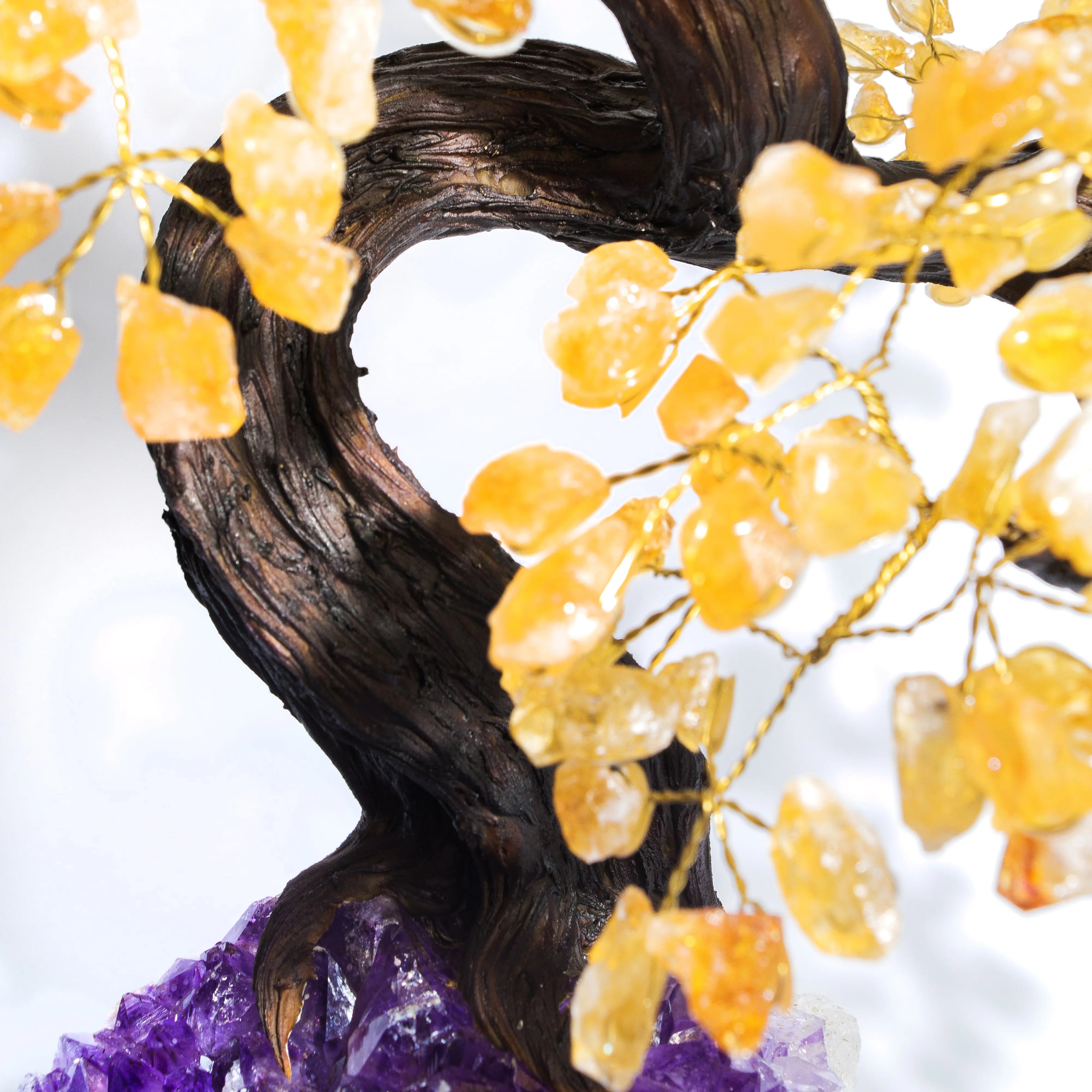 Close-up of Citrine Crystal Bonsai Tree with lustrous yellow gemstones, symbolizing prosperity and positive energy.