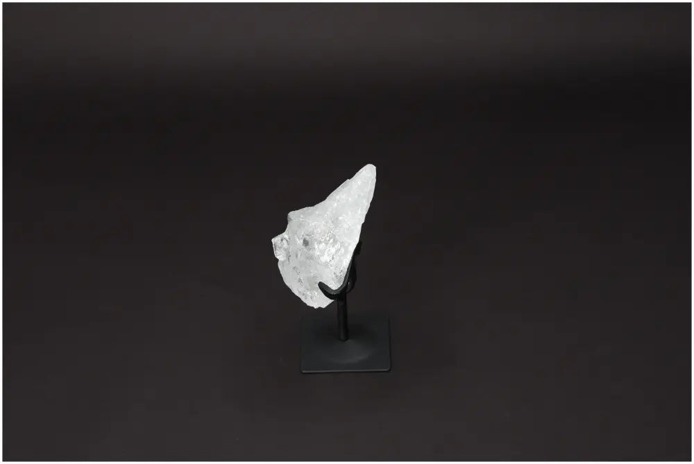 Rough Lemurian Clear Quartz on metal stand, premium Sylvia Crystals, harmonizing energy, decorative, transformative power.