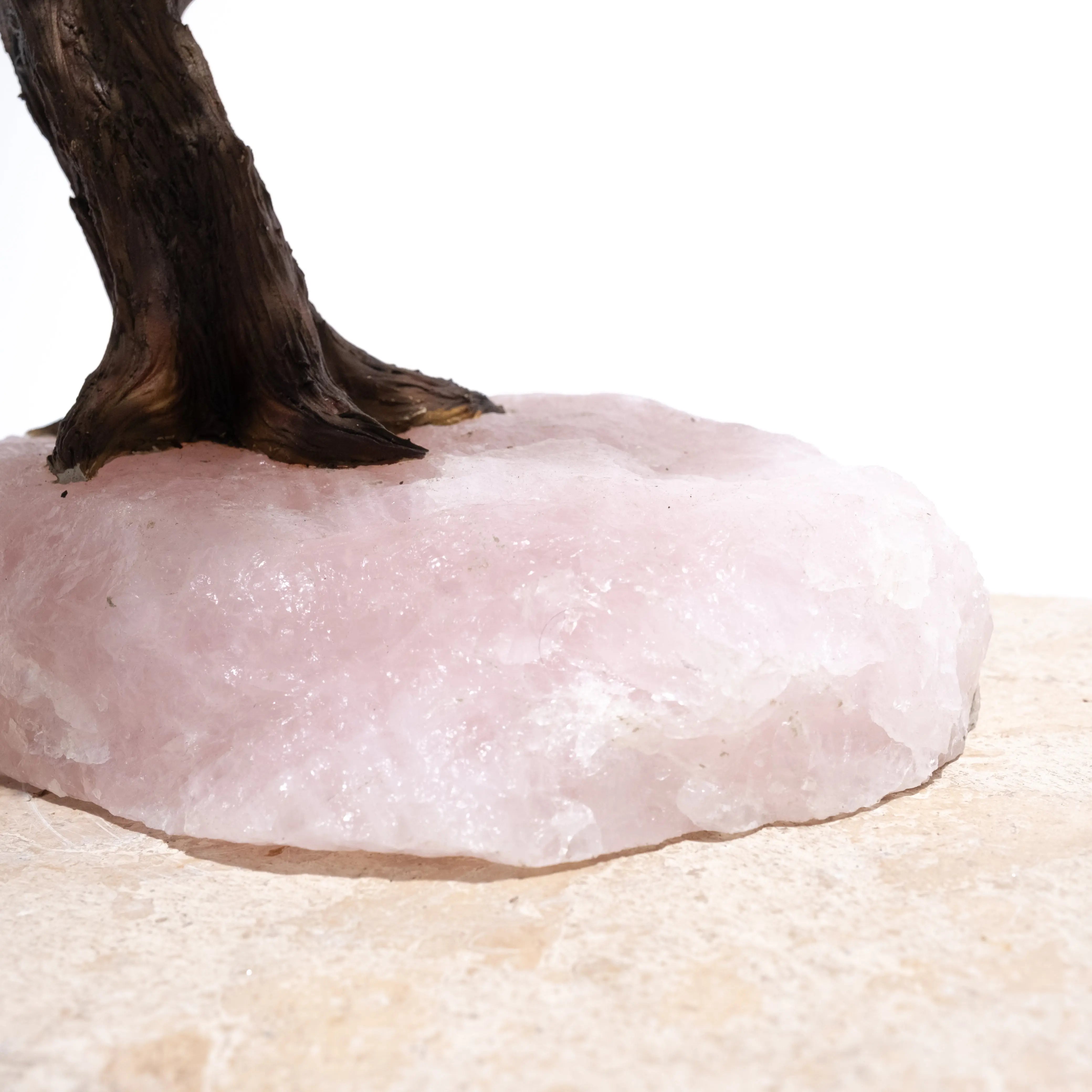 Base of Rough Quartz Bonsai Tree featuring a handcrafted wire trunk, highlighting natural pink quartz crystals for elegant home décor.