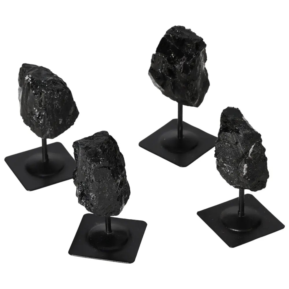 "Rough Tourmaline on Metal Stand S by Sylvia Crystals, showcasing natural black textures, ideal for decorative display."