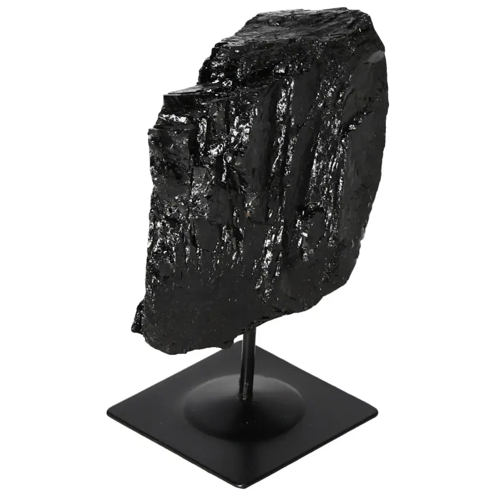 Rough Tourmaline on Metal Stand by Sylvia Crystals, featuring vibrant colors and energy-balancing properties, elegant home centerpiece.