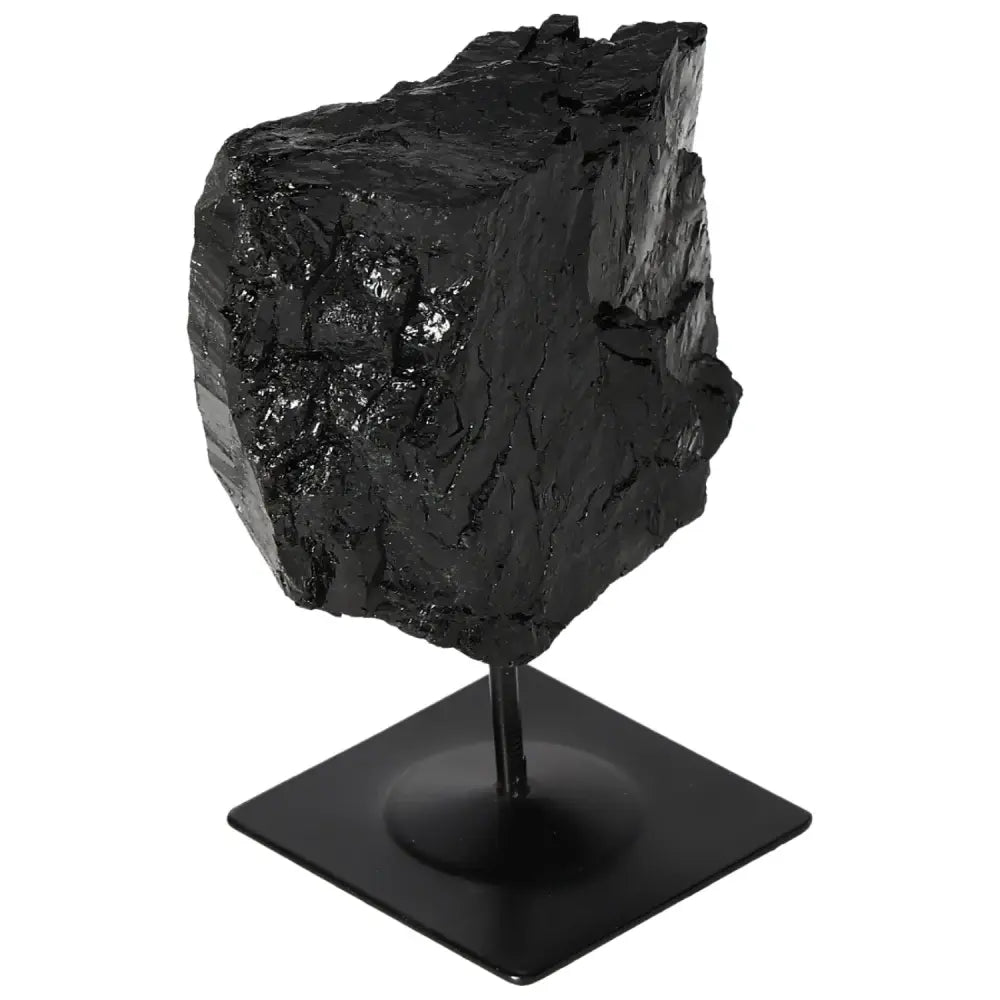 Rough Tourmaline With Metal Stand displaying a luxurious, energy-balancing stone from Sylvia Crystals, ideal for spiritual harmony.