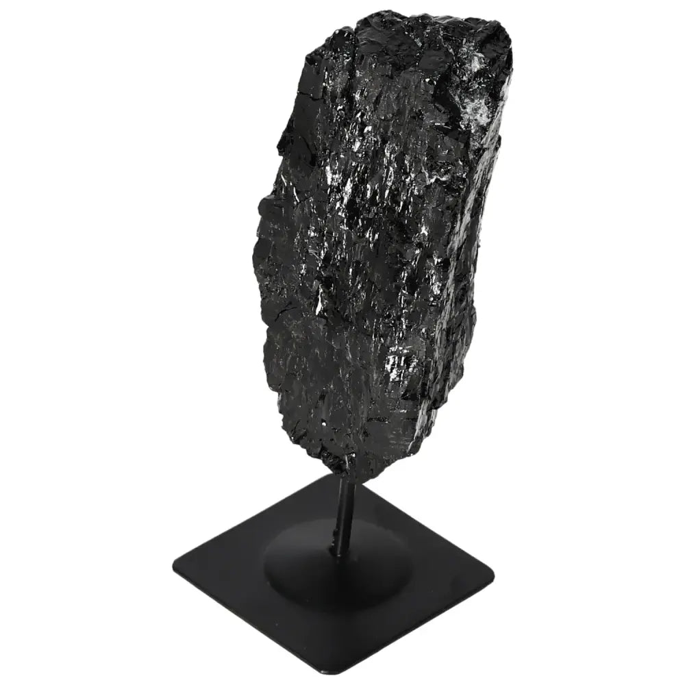 Rough Tourmaline with Metal Stand showcasing natural gemstones in black on a sturdy display, highlighting unique textures and energy properties.