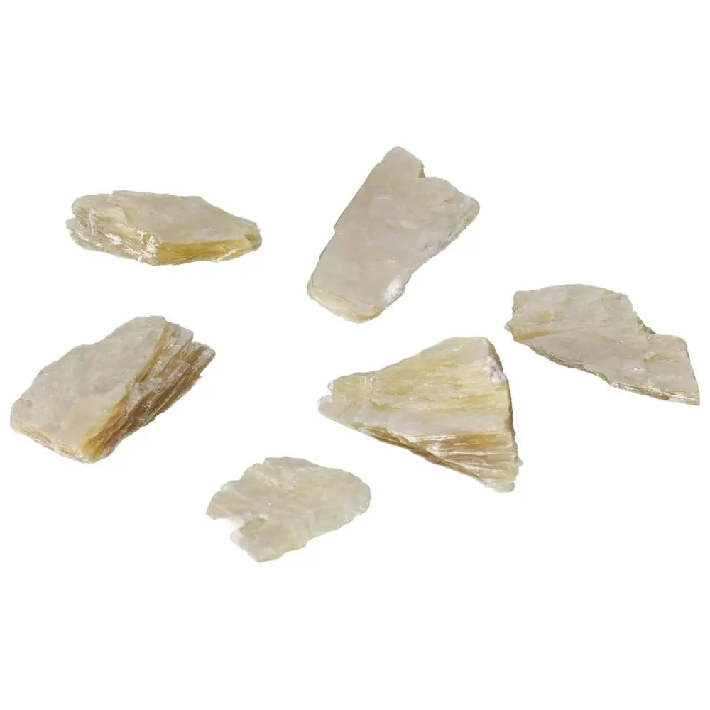 Assorted pieces of Rough Yellow Mica S crystal from Sylvia Crystals, showcasing natural beauty and spiritual energy.
