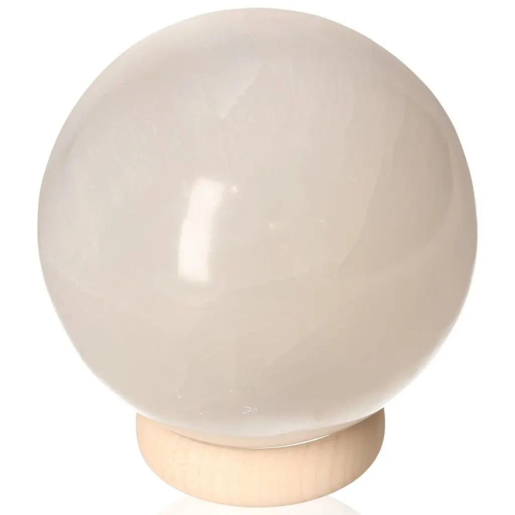14cm Selenite sphere by Sylvia Crystals, enhancing mindfulness and spiritual growth with premium ethically sourced crystal.