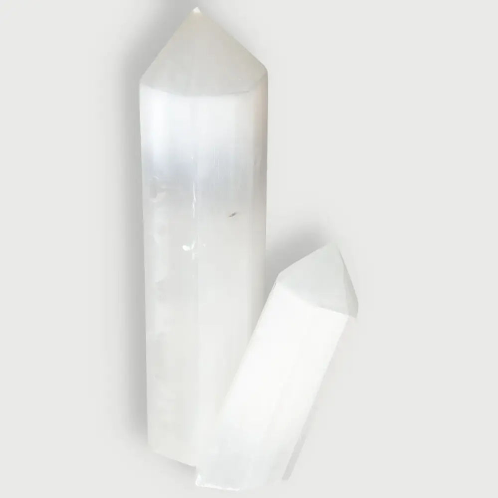 Two Selennite Points from Sylvia Crystals, perfect for spiritual growth and mindful living; premium-quality and ethically sourced.