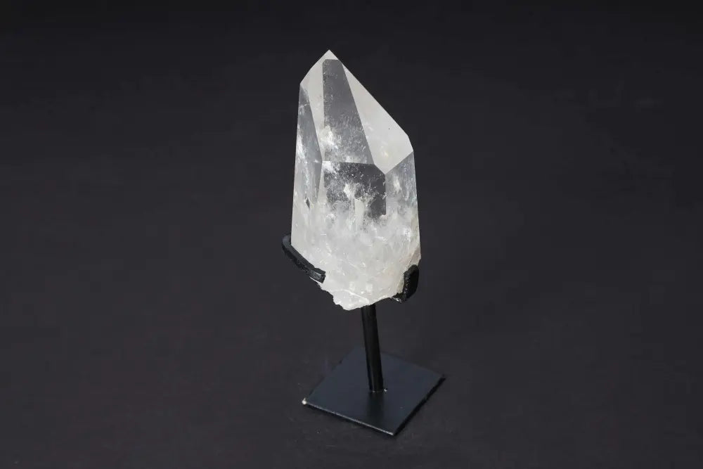 Semi Polished Clear Quartz Point on Stand - Amplifies energy and clarity, ideal for meditation and manifestation.