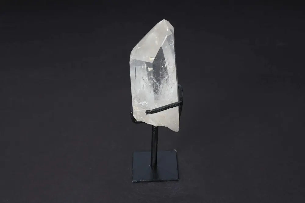 Semi Polished Clear Quartz Point on Stand for energy amplification and clarity, ideal for meditation and manifestation.