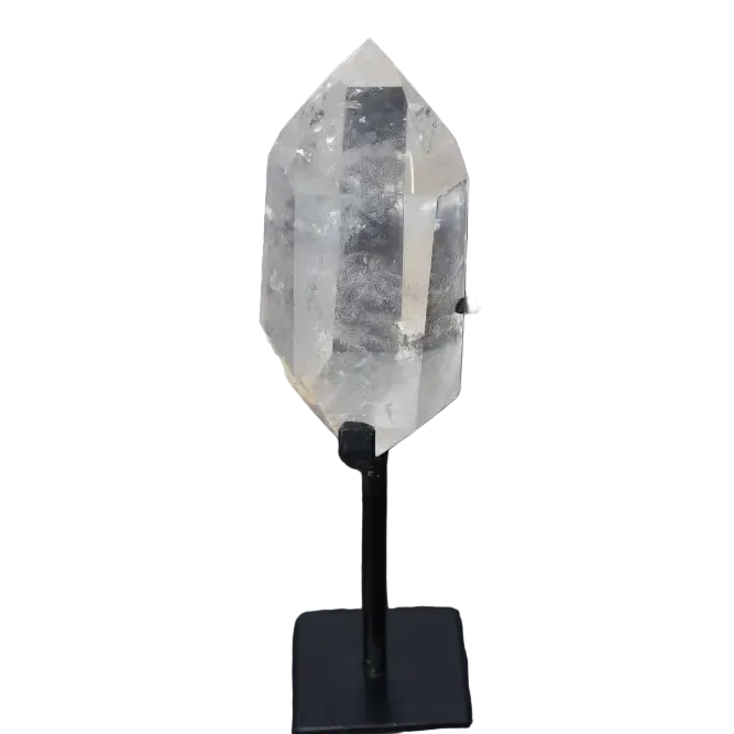 Semi polished clear quartz point on a stand for energy amplification and alignment.