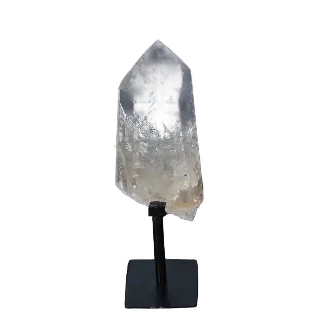 Semi polished clear quartz point with stand, known for energy amplification and clarity, displayed on a sleek modern stand.