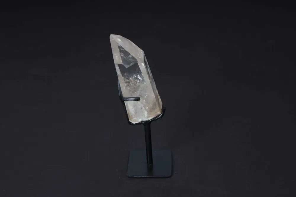 Semi Polished Clear Quartz Point with Stand for energy alignment and amplification, ideal centerpiece for meditation and manifestation.
