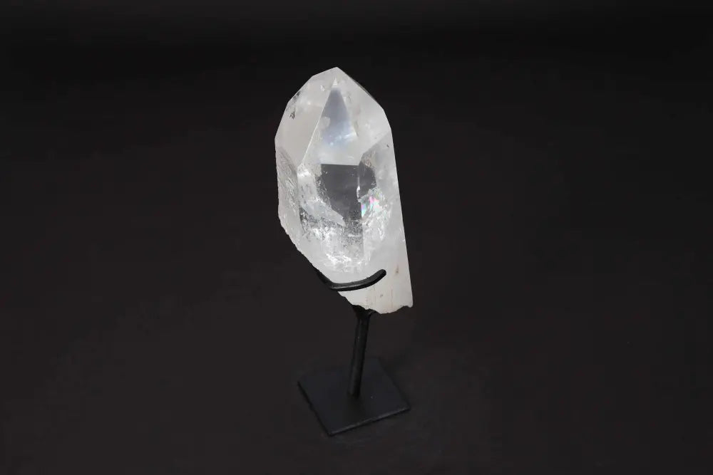 Semi Polished Clear Quartz Point on Stand for energy amplification and clarity, ideal for meditation and manifestation work.