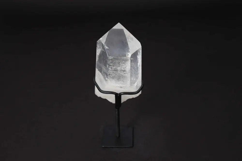 Semi Polished Clear Quartz Point on Stand for energy amplification and alignment, ideal for meditation and manifestation.