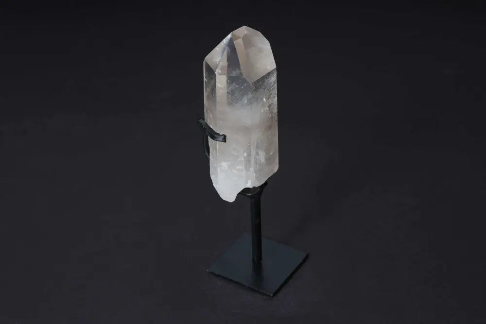 Semi-Polished Smoky Quartz Point on Stand offering grounded elegance and protective energy, perfect for decor and spiritual use.
