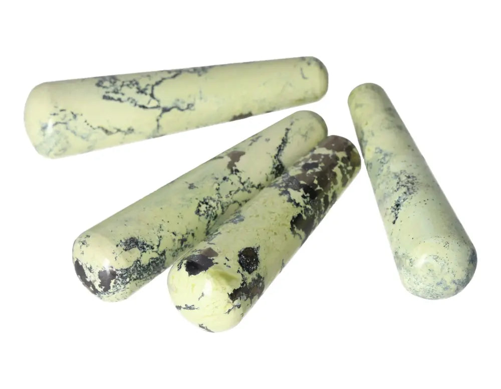 Serpentine wands for spiritual healing and meditation, enhancing emotional balance and heart chakra activation.