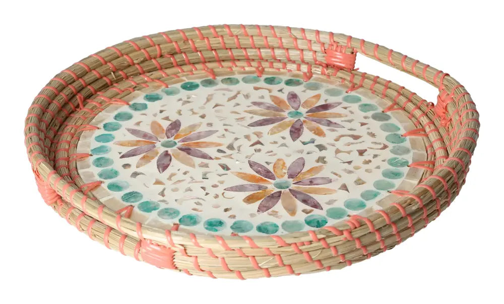 Decorative round serving tray with capiz shell inlay and floral design, featuring woven accents for a luxury dining experience.