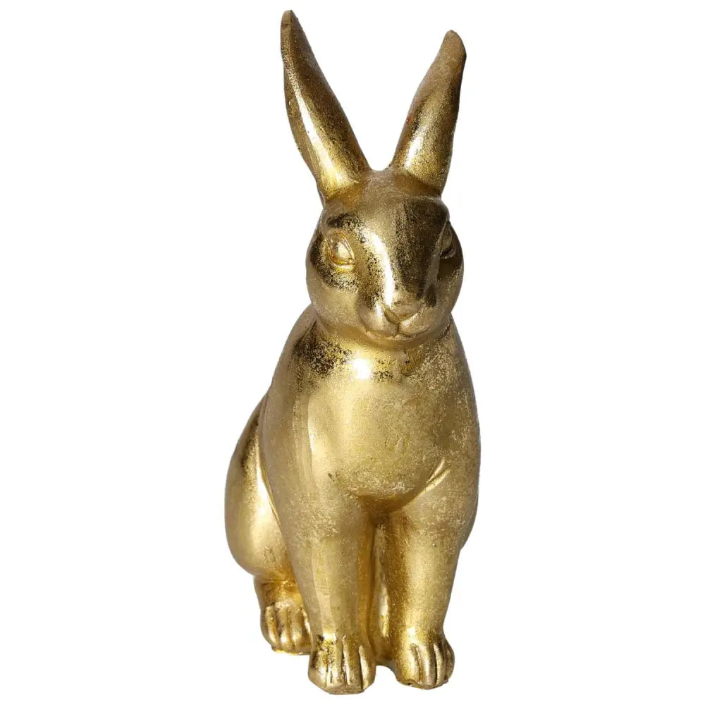 Luxurious golden rabbit figure home decor from Sylvia Crystals, epitomizing elegance and conscious living.