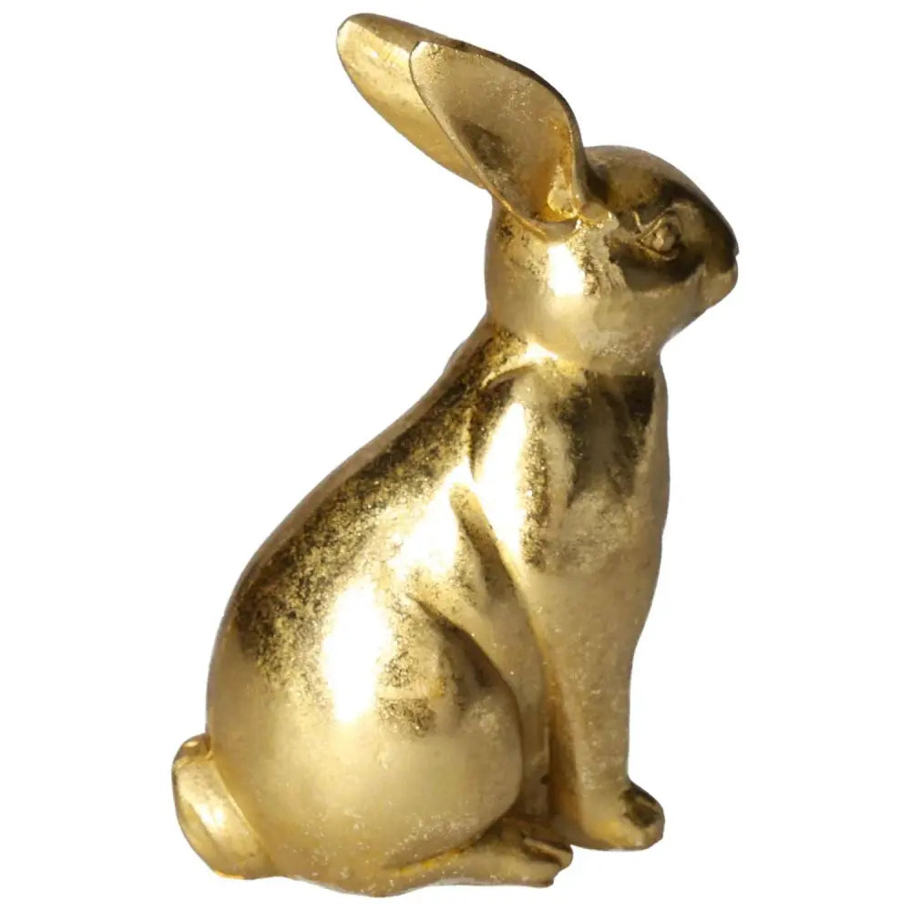 Elegant gold rabbit figure for luxurious home decor, promoting Sylvia Crystals' blend of style and spirituality.