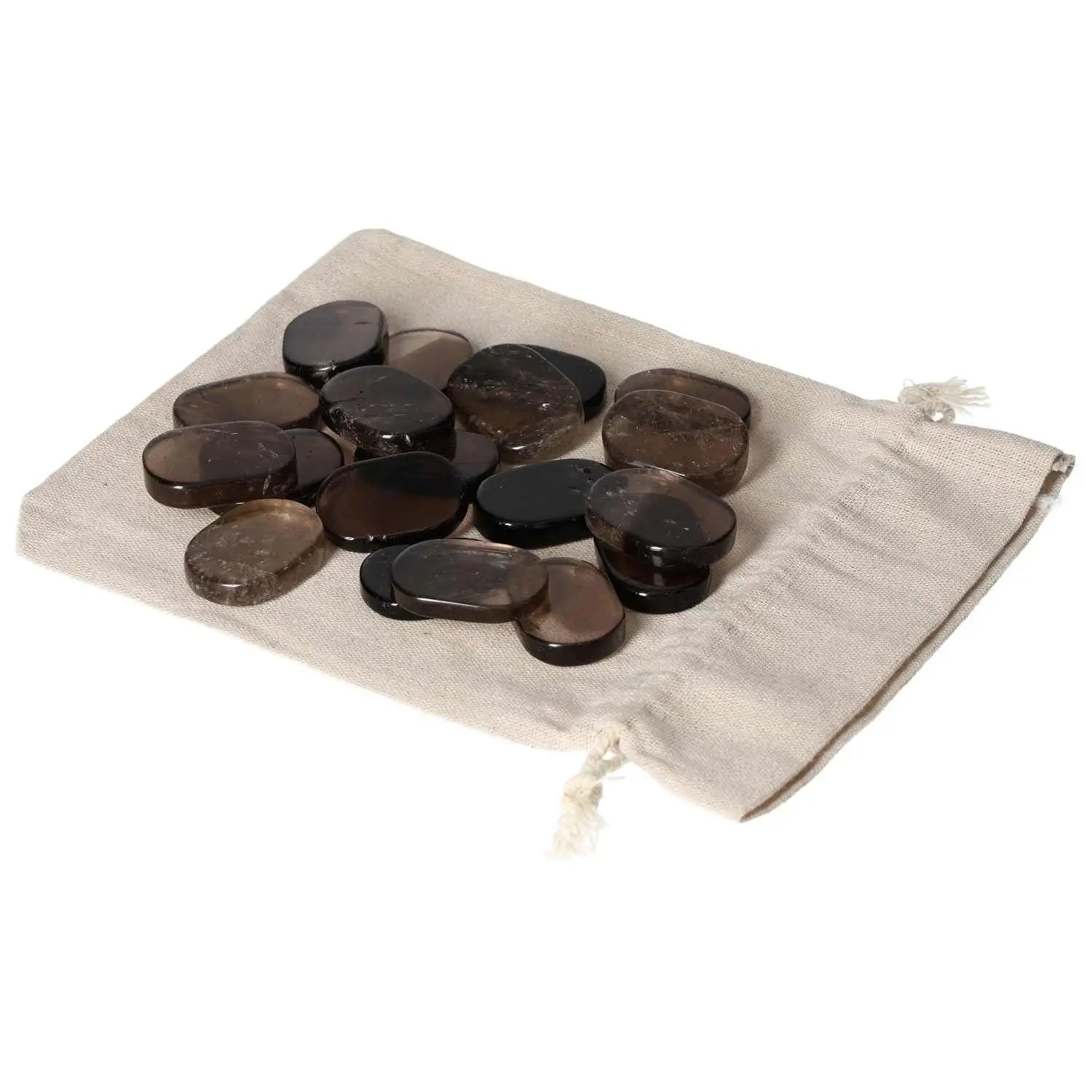 Smoky quartz thumb massagers on a beige drawstring bag, ideal for stress relief and spiritual wellbeing, from Sylvia Crystals.
