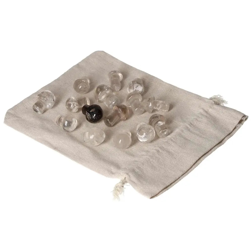 Collection of Smoky Quartz small mushroom crystals on a cloth, perfect for decision-making and stress relief.