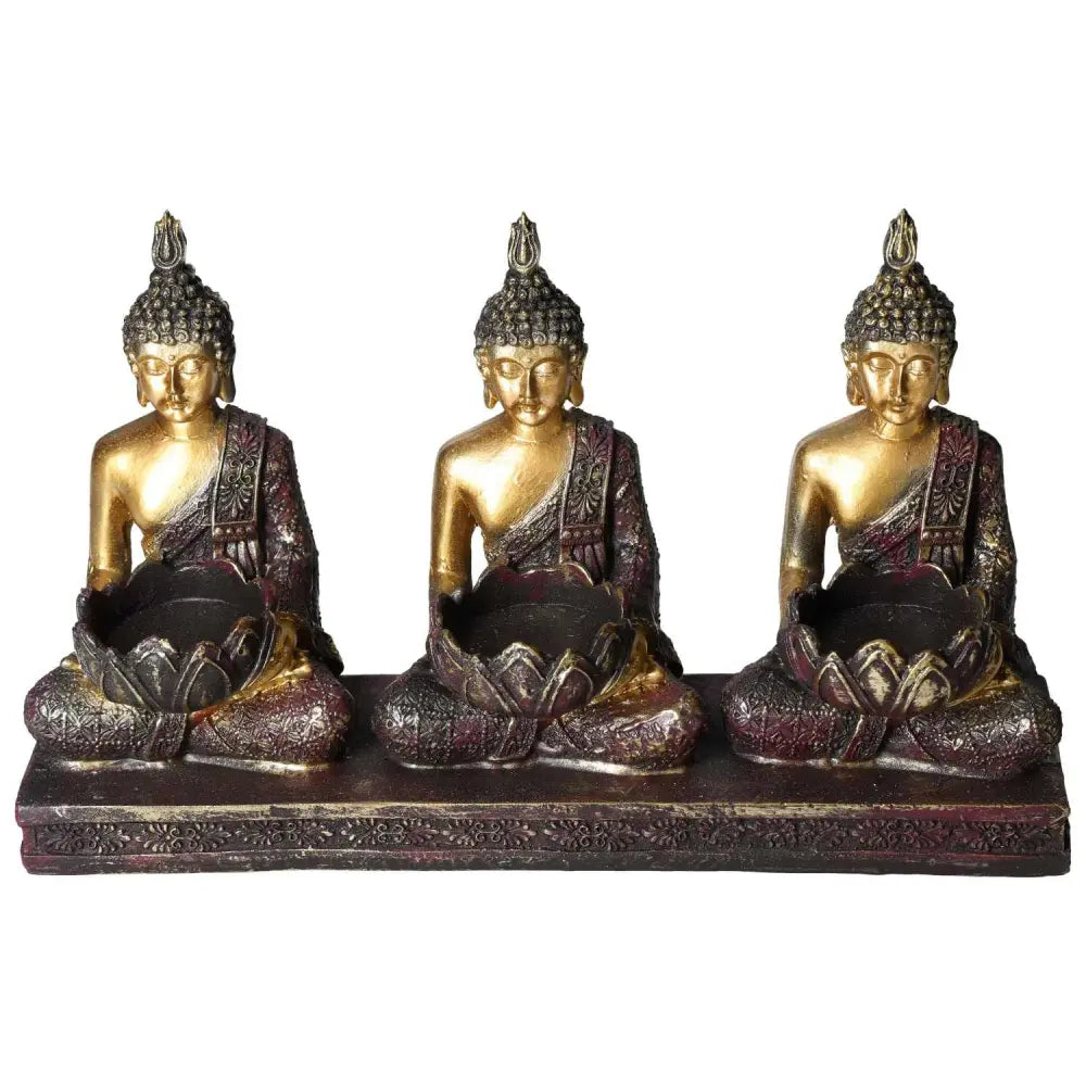 Triple Buddha tealight holder with intricate design, perfect for adding spirituality and luxury to any space.