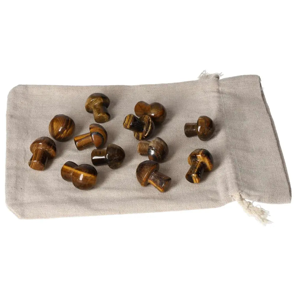 Tiger's Eye small mushroom stones on linen bag for joy, stability, and mental clarity support.
