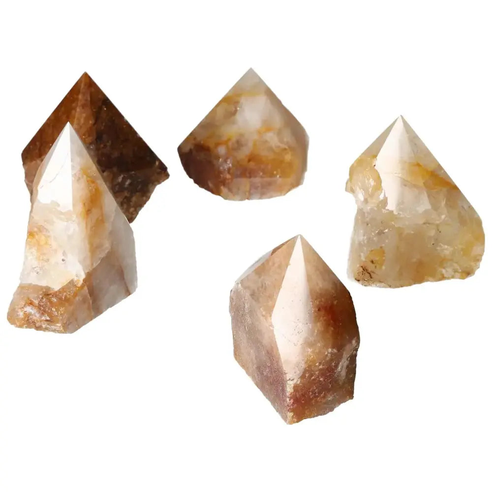 Top Polished Hematoide L crystals showcasing red and orange hues, from Sylvia Crystals. Exquisite craftsmanship, powerful energy.