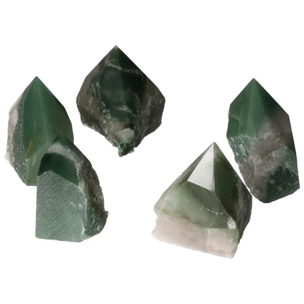Top Polished Point Green Quartz Bi-Color M gemstones from Sylvia Crystals, showcasing green hues and a polished finish.