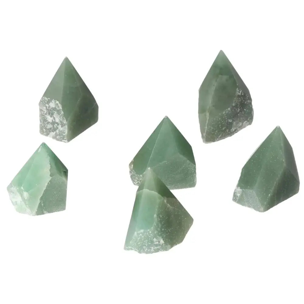 Top Polished Point Green Quartz XS crystals from Sylvia Crystals, showcasing intricate craftsmanship and spiritual elegance.