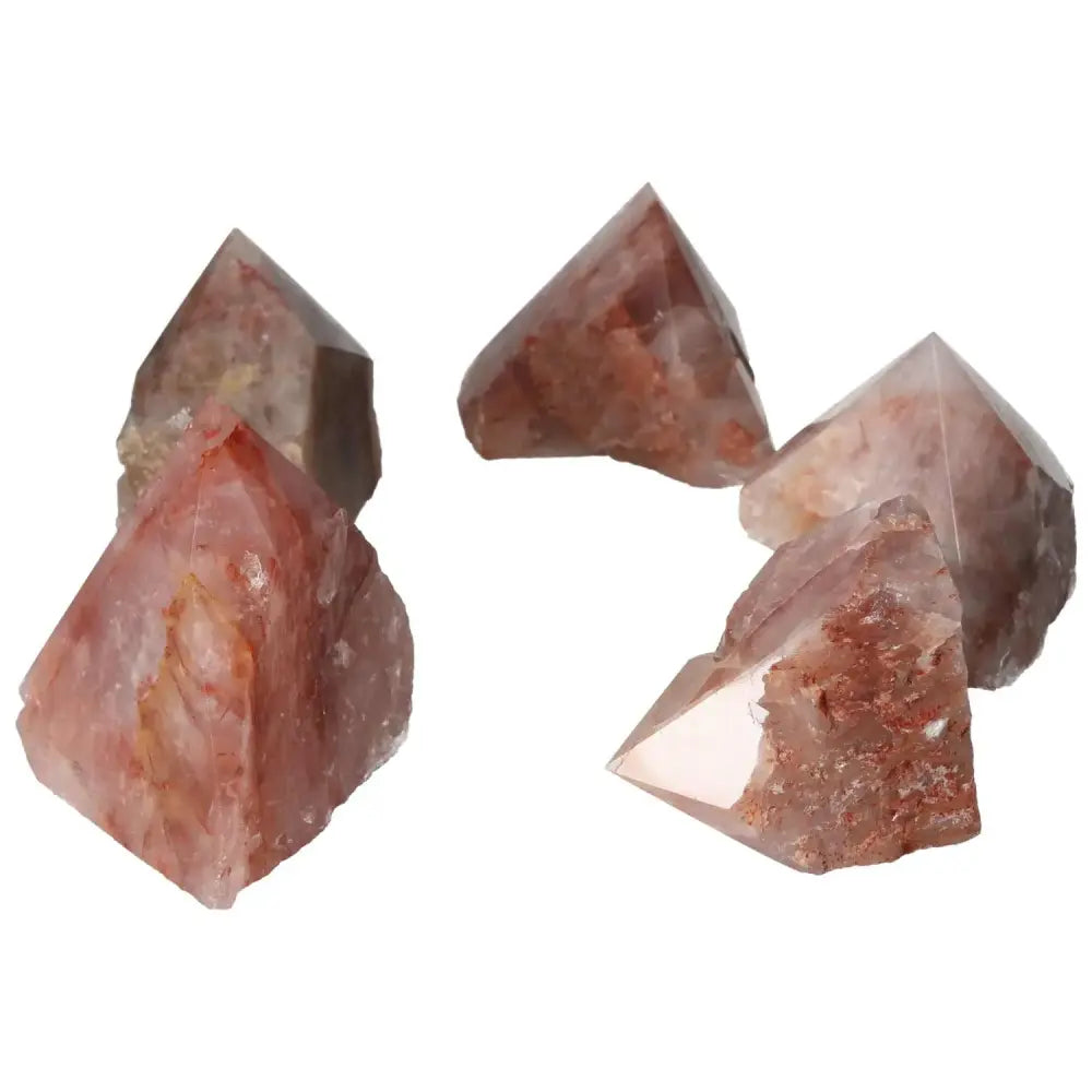 Top Polished Point Pink Hematoide crystals from Sylvia Crystals, showcasing delicate pink hues and natural beauty for serenity and energy.