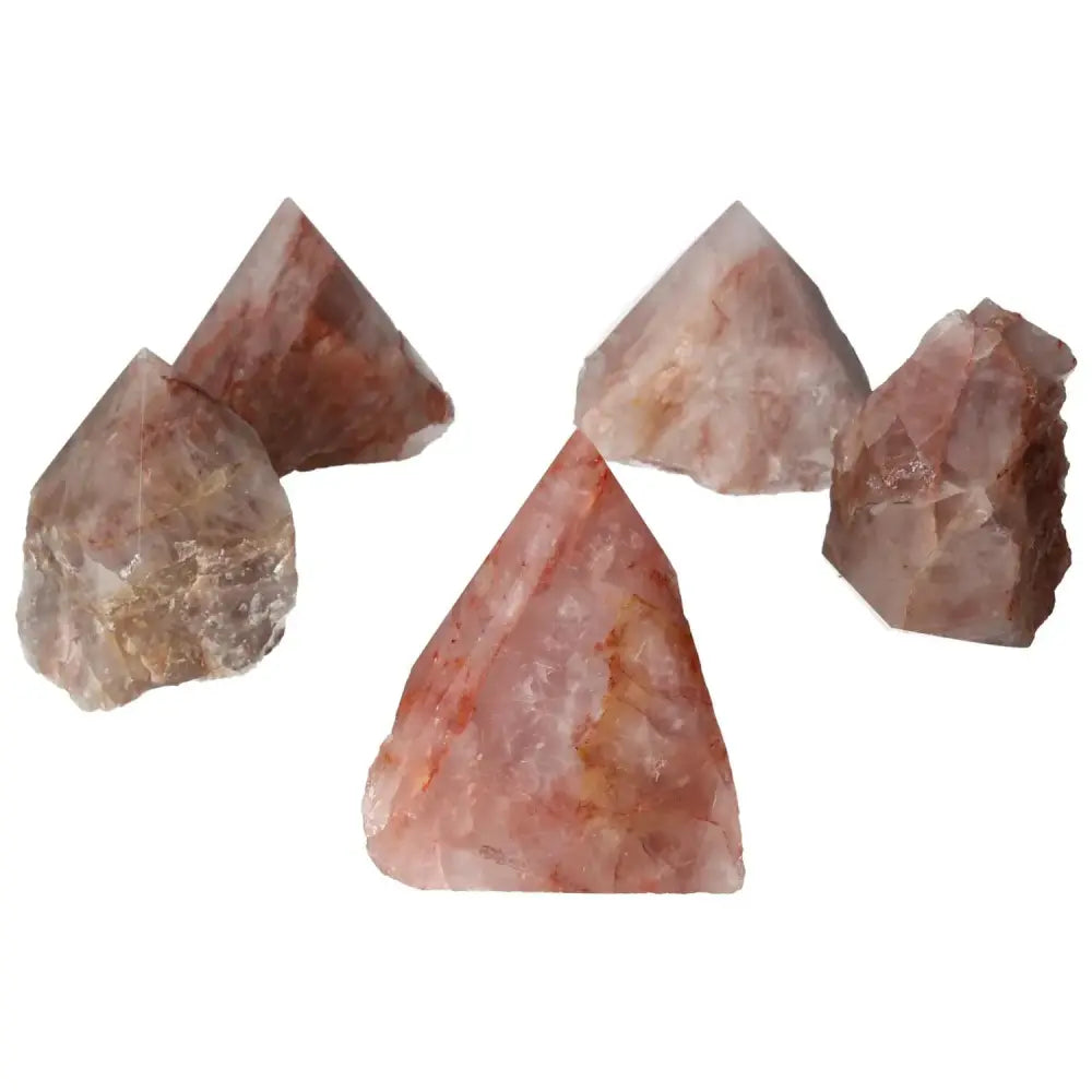 Top Polished Point Pink Hematoide M crystals by Sylvia Crystals, featuring elegant pink hues and heart chakra resonance.