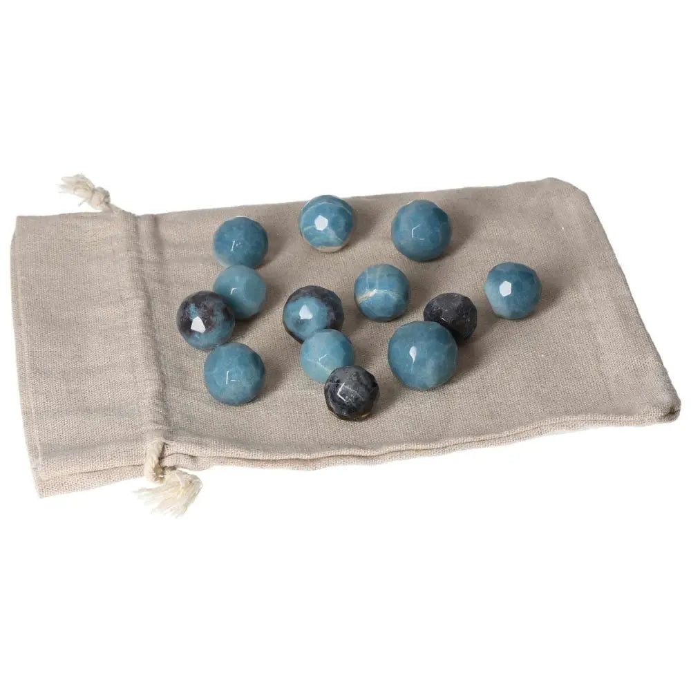 Trolleite geometric spheres in blue hues, enhancing intuition and spiritual awareness, displayed on a linen bag.