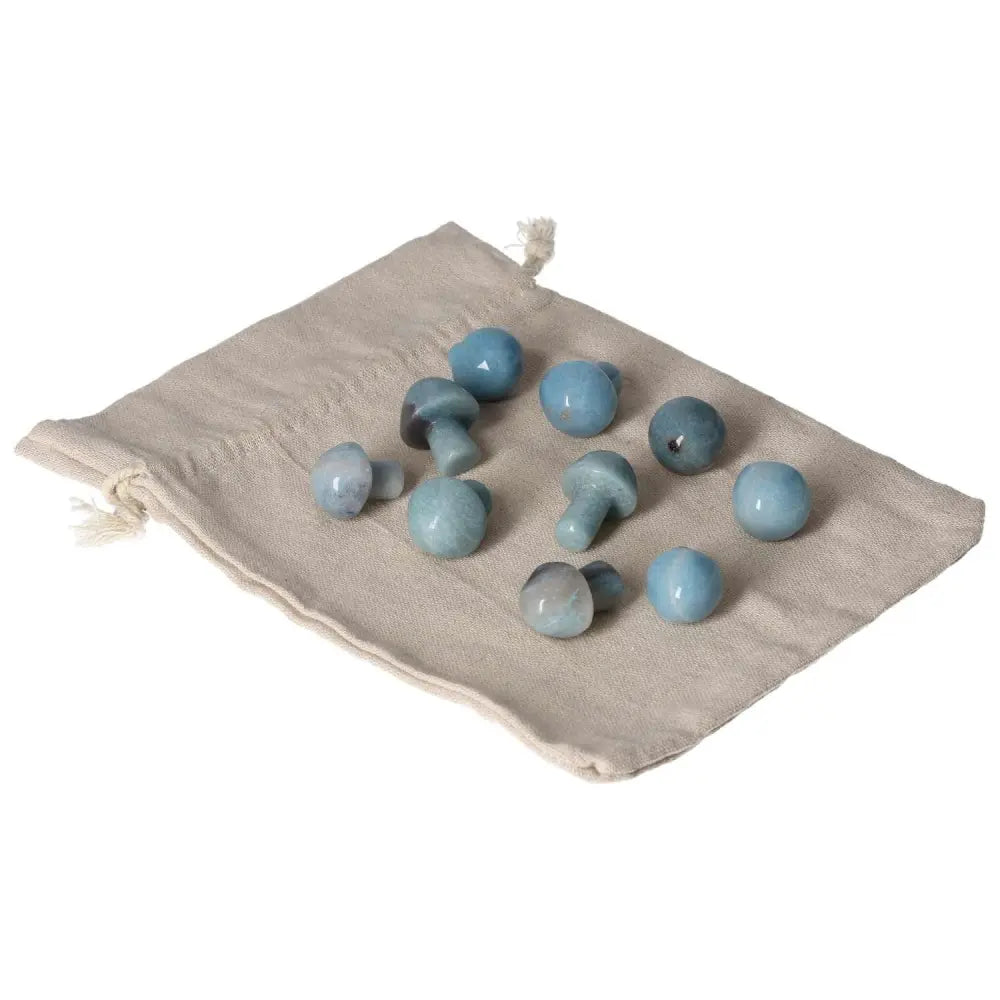 Trolleite small mushroom stones on a pouch, showcasing blue to violet hues for spiritual insight and chakra activation.