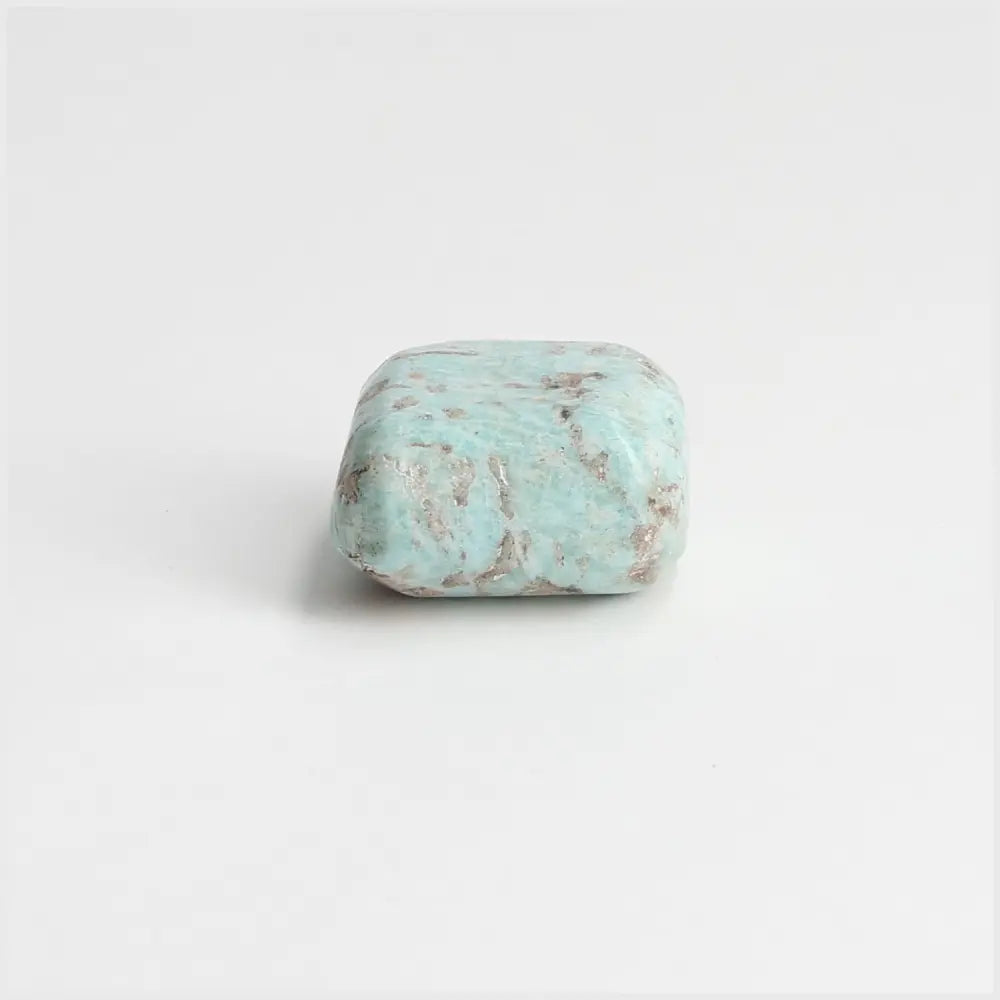 Tumbled Amazonite stone with soothing turquoise and green shades, promoting emotional balance and clear communication.