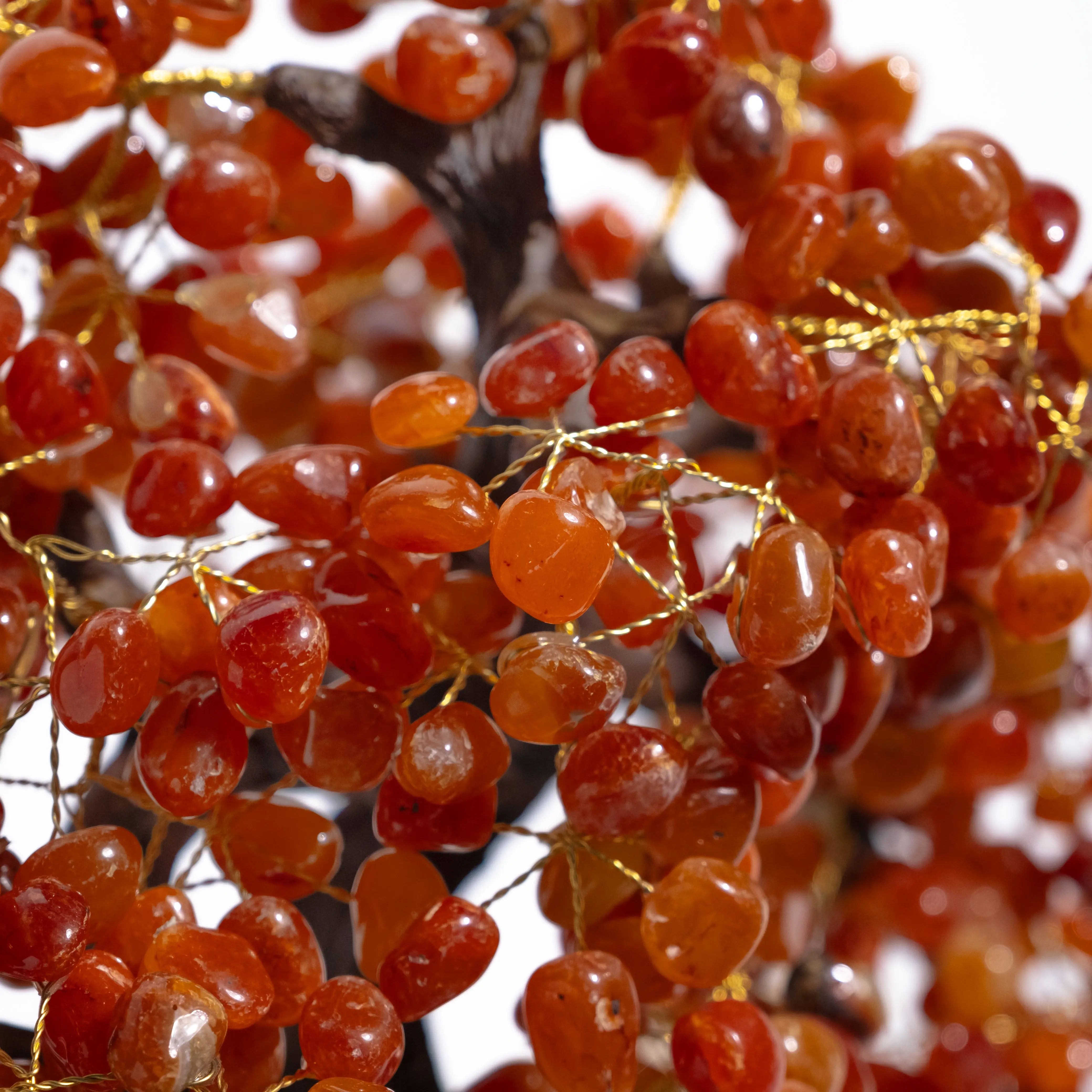 Close-up of a Tumbled Carnelian Bonsai Tree, showcasing polished carnelian gemstones for creativity and positive energy.