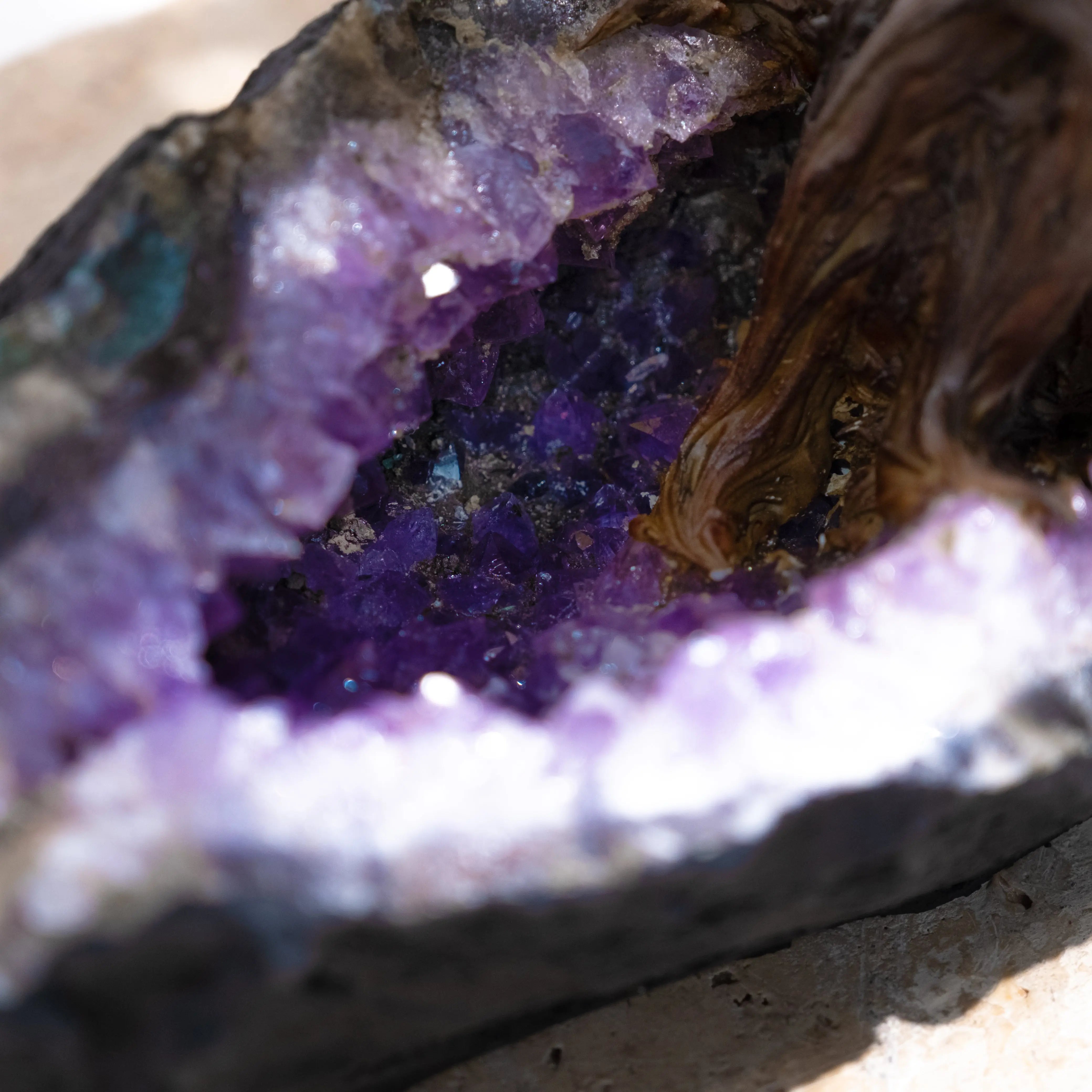 Close-up of a vibrant amethyst geode capturing the rich purple hues and crystal formations.
