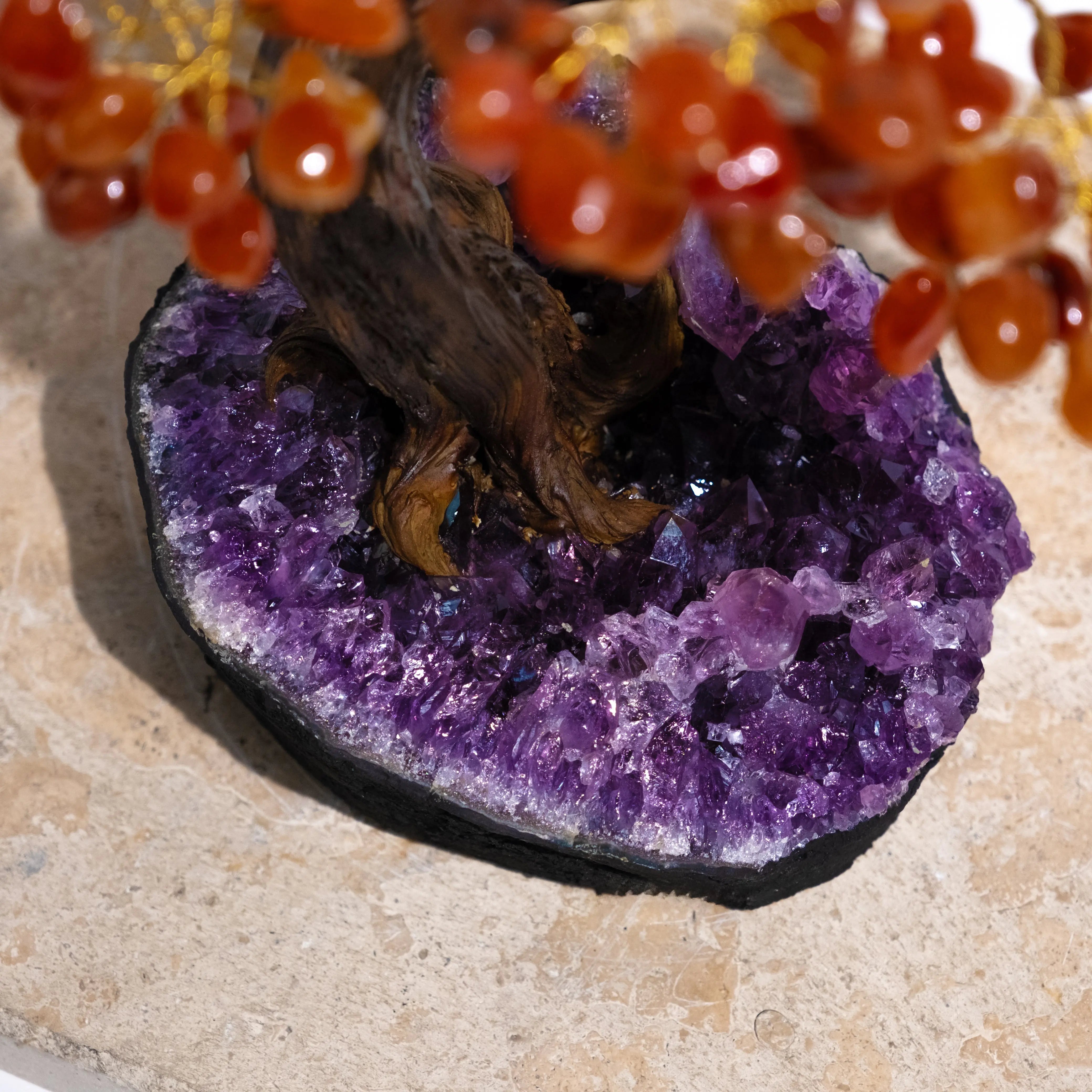 Tumbled Carnelian Bonsai Tree with Amethyst Geode Base, enhancing creativity and positive energy, featuring polished gemstones.