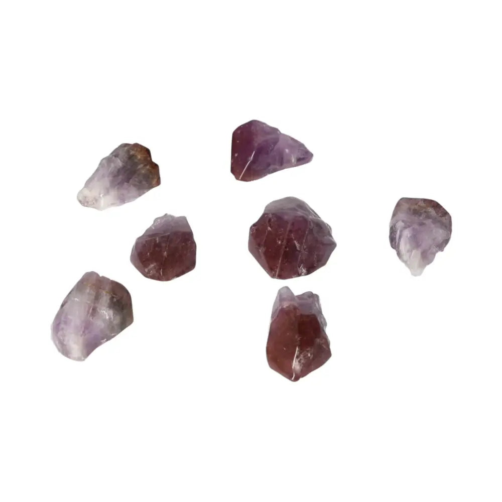 Tumbled Point Amethyst M crystals from Sylvia Crystals, known for reducing stress and enhancing concentration.