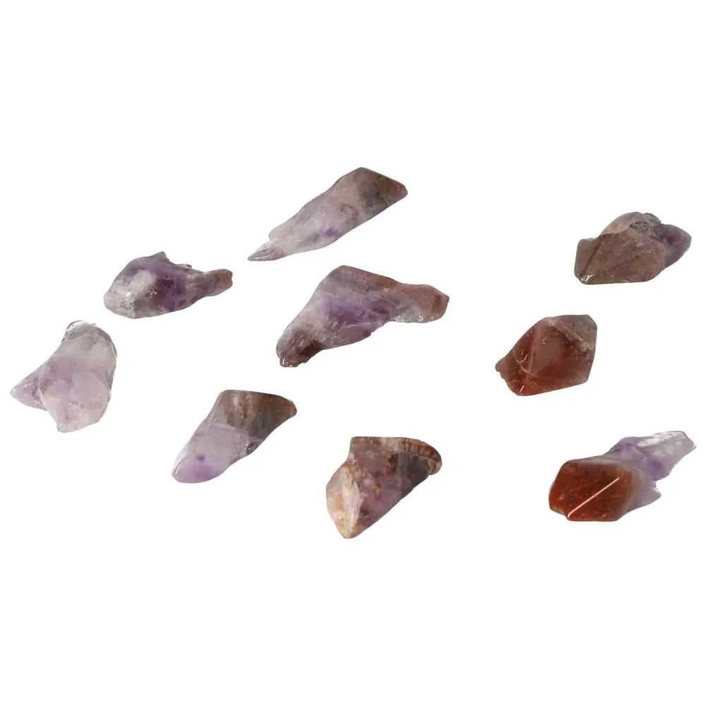 Tumbled Point Amethyst S stones from Sylvia Crystals, showcasing calming purple hues and natural beauty for emotional stability.