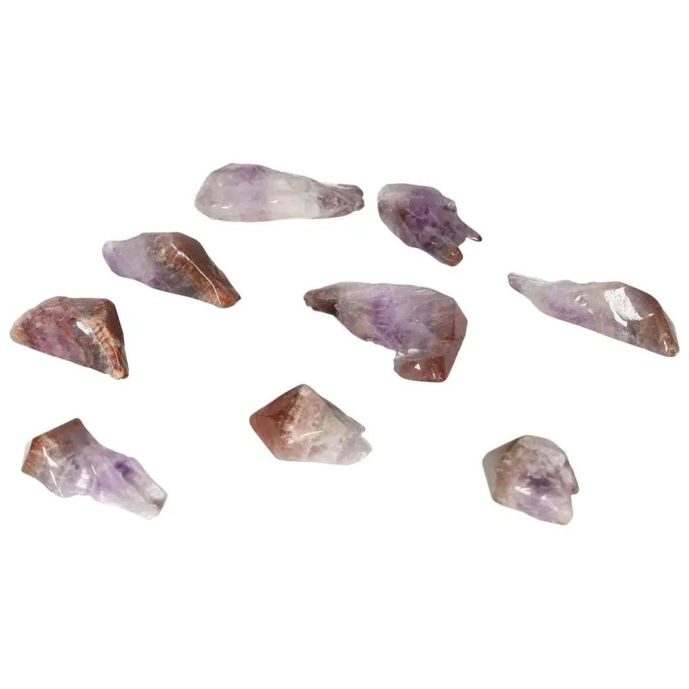 Tumbled Point Amethyst S crystals, premium quality by Sylvia Crystals, enhancing emotional stability and concentration, stress-reducing gem.
