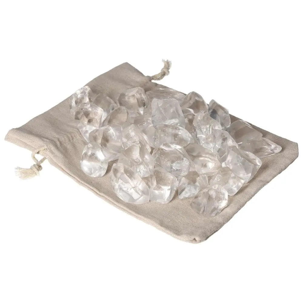 Tumbled Quartz Ice Cubes on beige bag, premium pieces by Sylvia Crystals, blending elegance and spirituality for a luxurious touch.