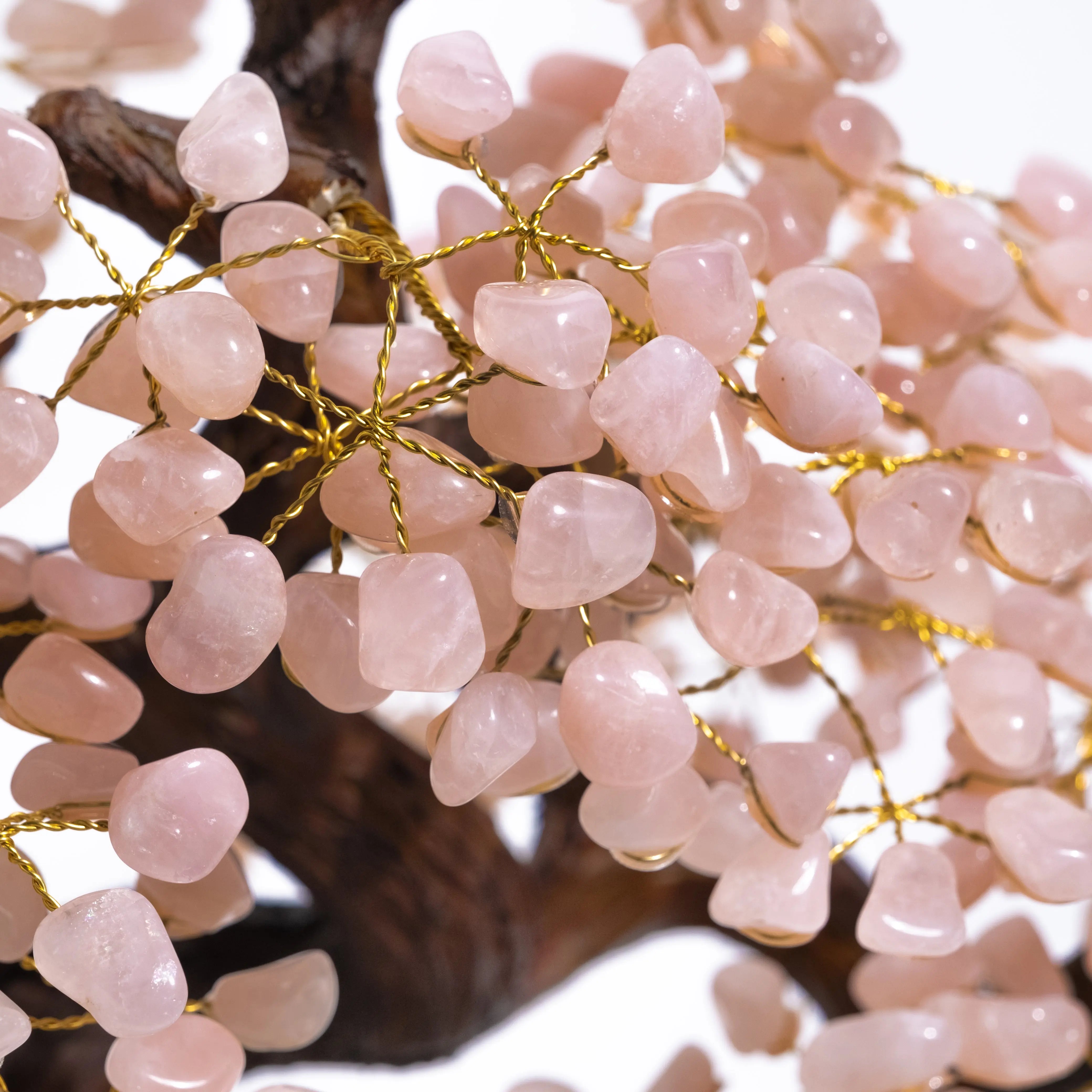 Close-up of a Tumbled Quartz Bonsai Tree with delicate wire branches, showcasing rose quartz stones for healing and decorative elegance.