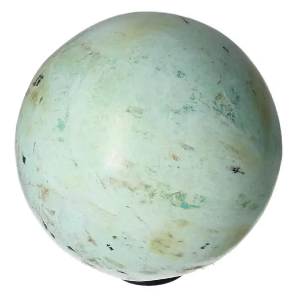 Turquoise sphere promoting communication and kindness, believed to bring good fortune and protect against evil during travels.