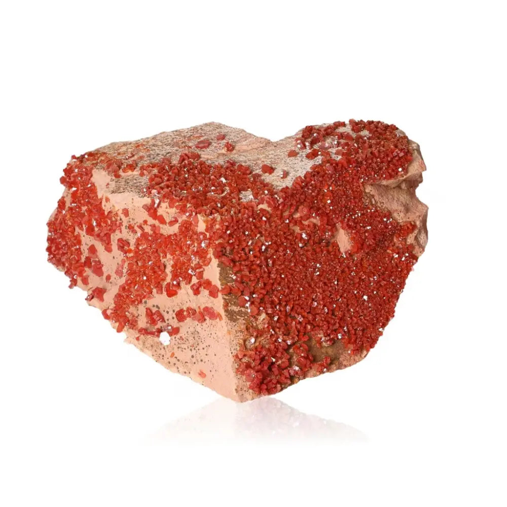 Vanadinite Druze crystal with vibrant red-orange hues, known for enhancing focus and creativity, ideal for collectors and creatives.