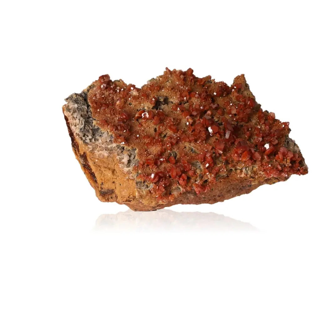 Vanadinite Druze mineral showcasing vibrant red-orange crystal formations, ideal for collectors and promoting focus and creativity.