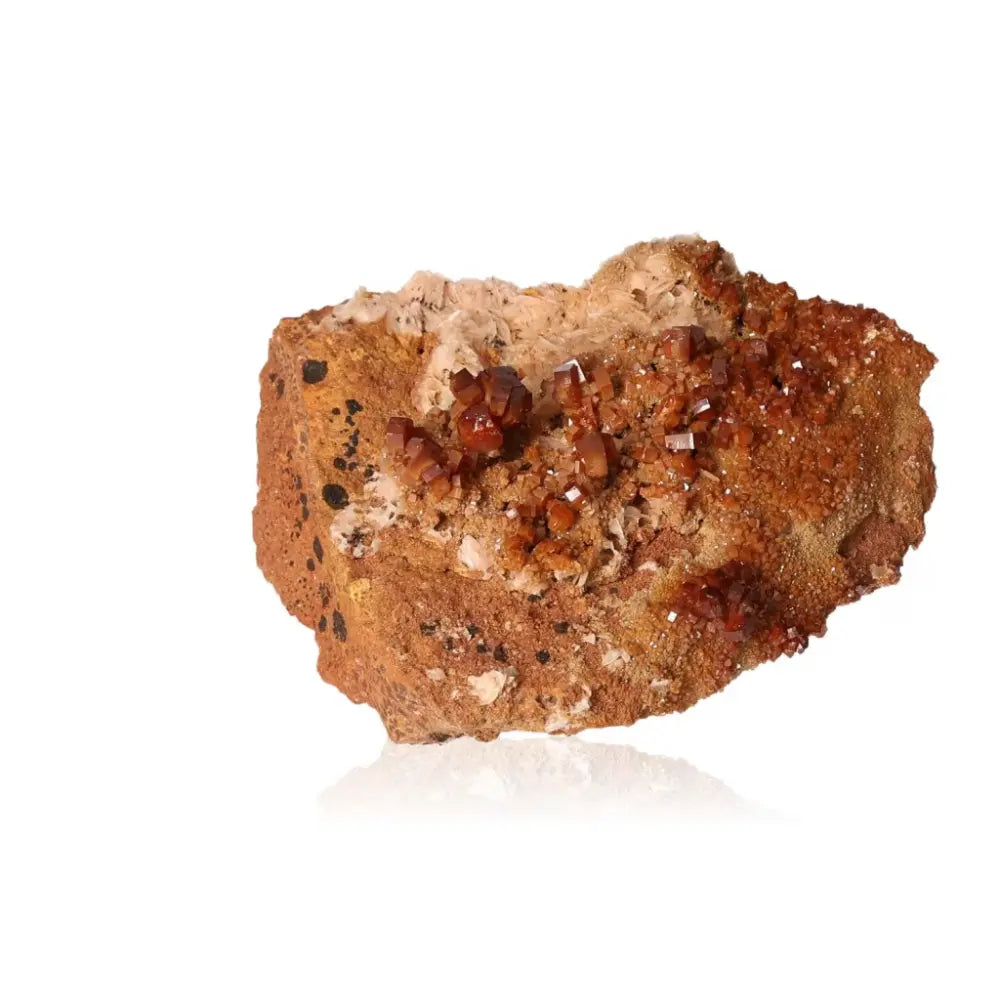 Vanadinite Druze with vibrant red-orange crystals on a rocky matrix, known for focus and creativity. Ideal for collectors and creatives.